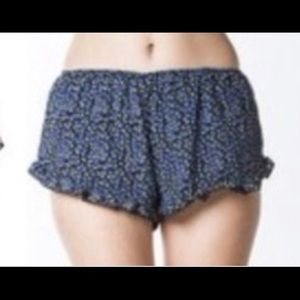 Brandy Melville blue & white floral mini shorts